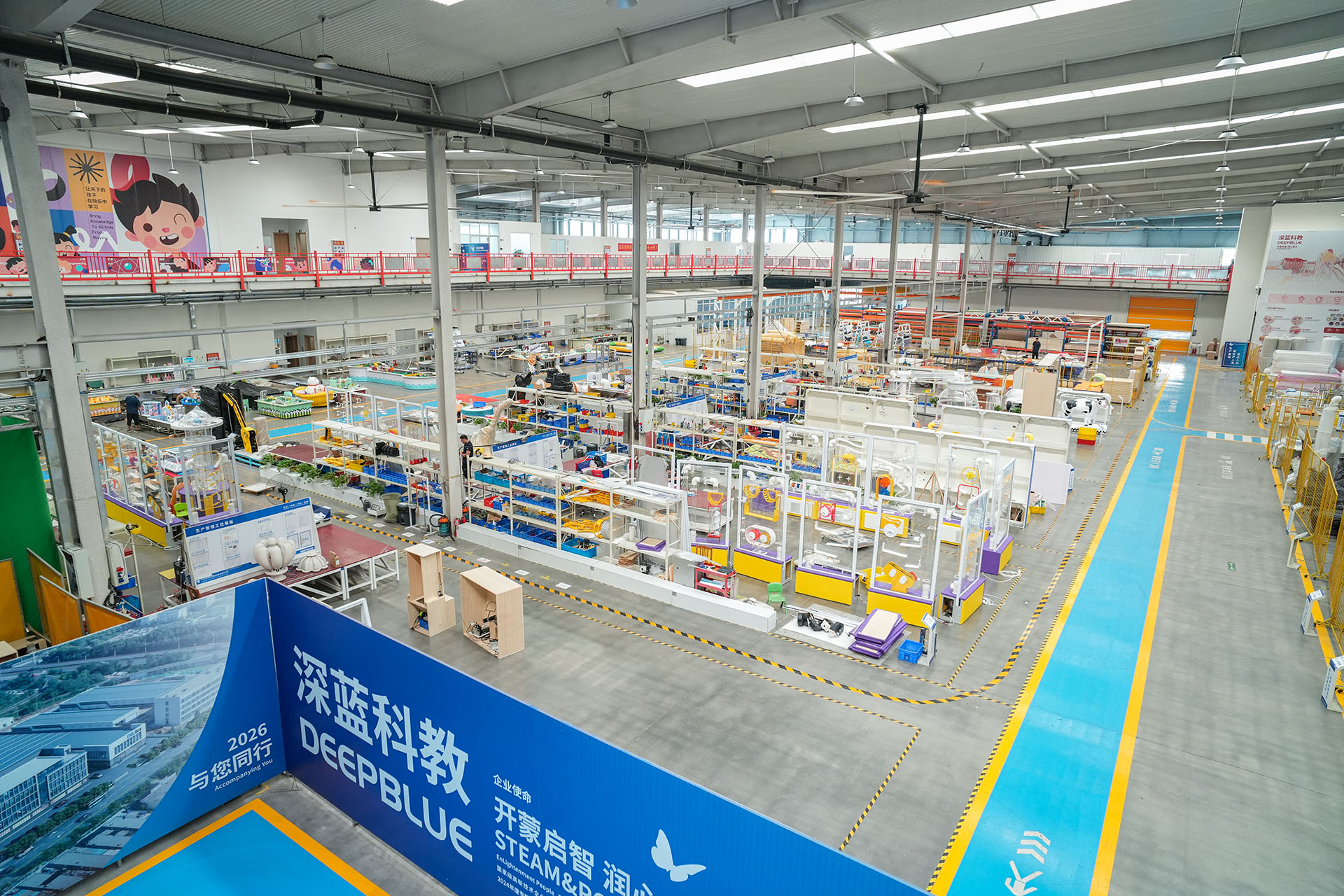 DEEPBLUE exhibit manufacturing workshop Panoramic view of DEEPBLUE's exhibit assembly workshop and blue logistics aisles